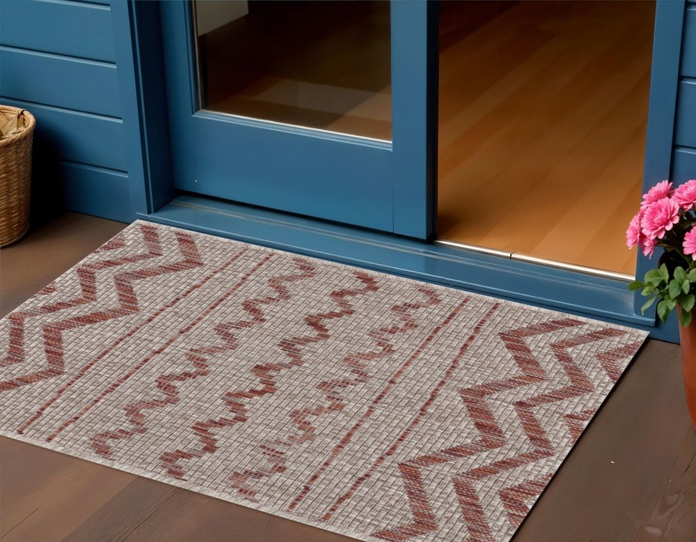 8' X 10' Beige And Red Chevron Indoor Outdoor Area Rug