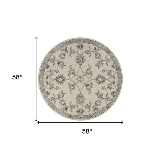 7' Ivory And Blue Wool Hand Tufted Round Rug