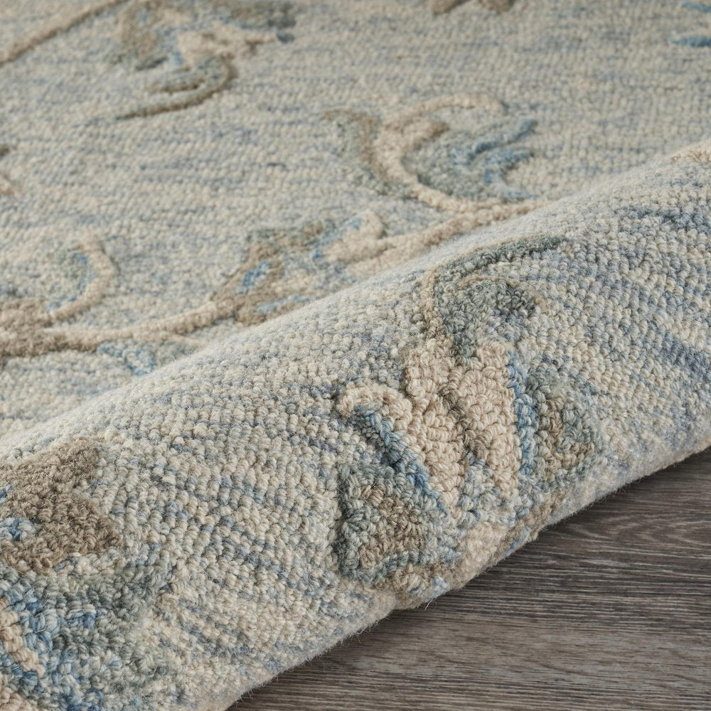7' X 9' Blue And Ivory Wool Hand Tufted Area Rug