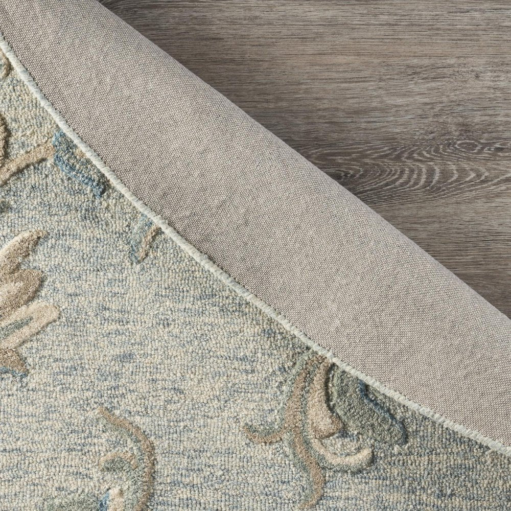7' X 9' Blue And Ivory Wool Hand Tufted Area Rug