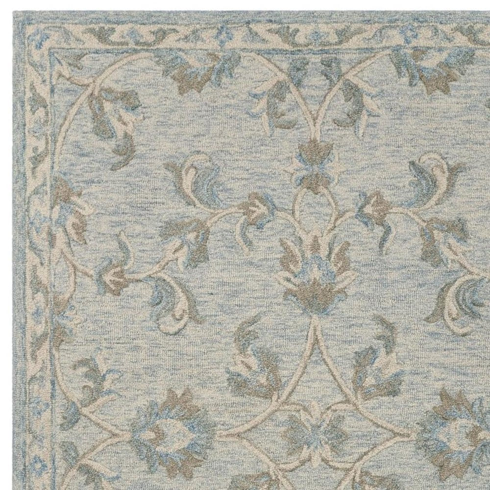 5' X 7' Blue And Ivory Wool Hand Tufted Area Rug