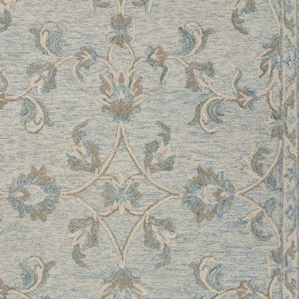 5' X 7' Blue And Ivory Wool Hand Tufted Area Rug