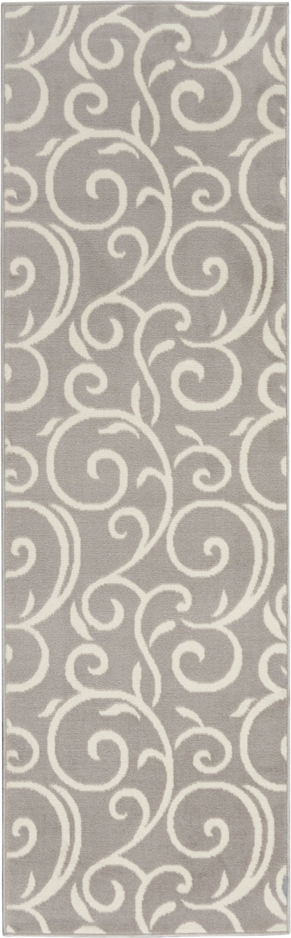 Gray runner rug with white ornate swirling scroll damask pattern and soft texture.