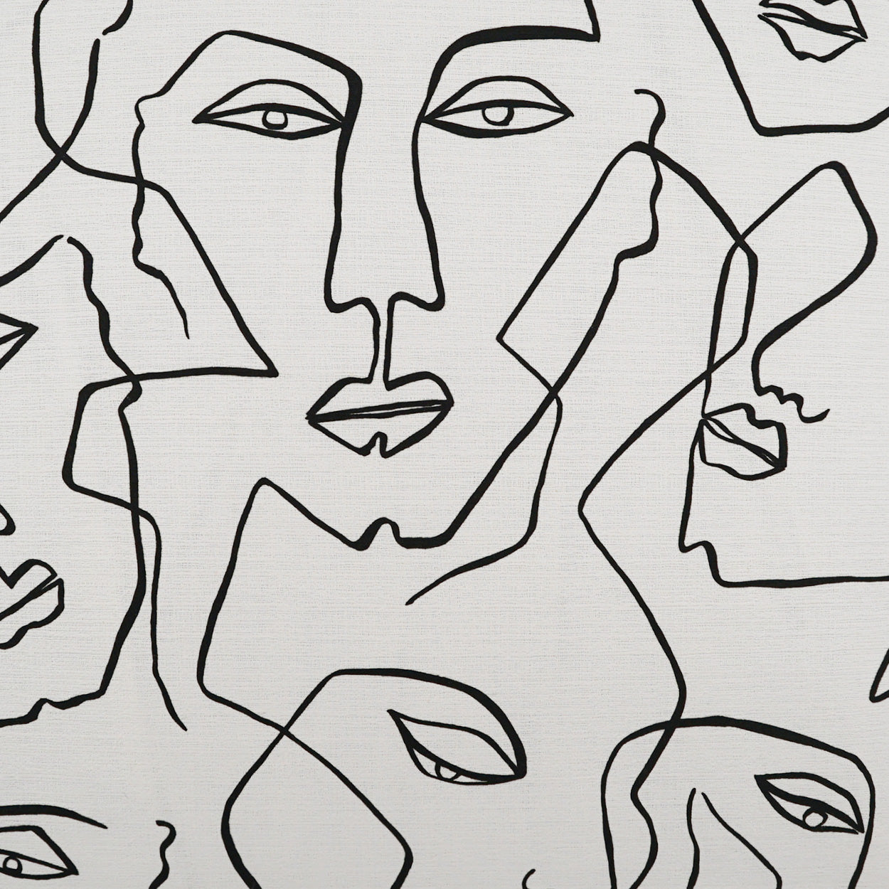 Cream fabric with bold black abstract face line art; center features a pale gray square overlay.
