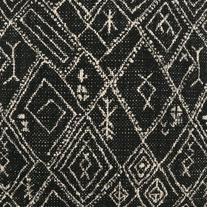 Black fabric with cream geometric diamonds & square motifs in a woven pattern