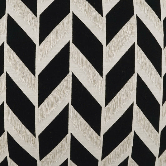 Black and cream chevron woven fabric with textured beige zigzags for upholstery.