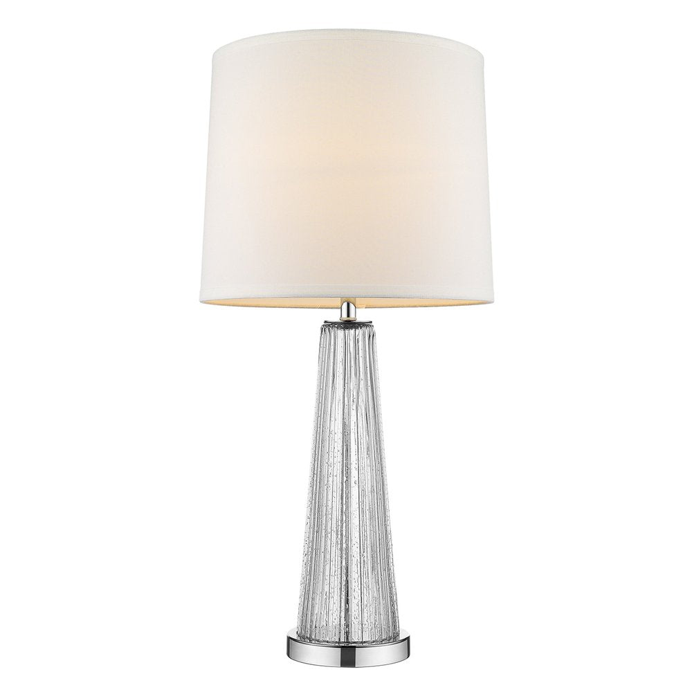 Silver tapered textured metal lamp base with a white drum shade; modern table lamp for living room.