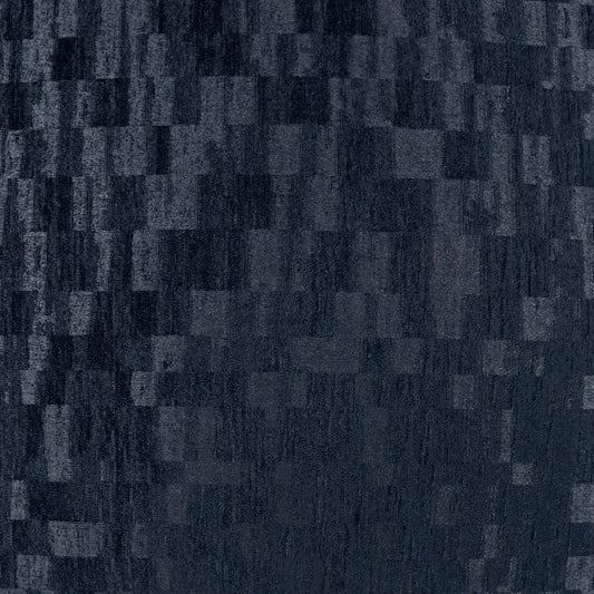 Dark indigo denim-like woven fabric with a subtle square patchwork texture.