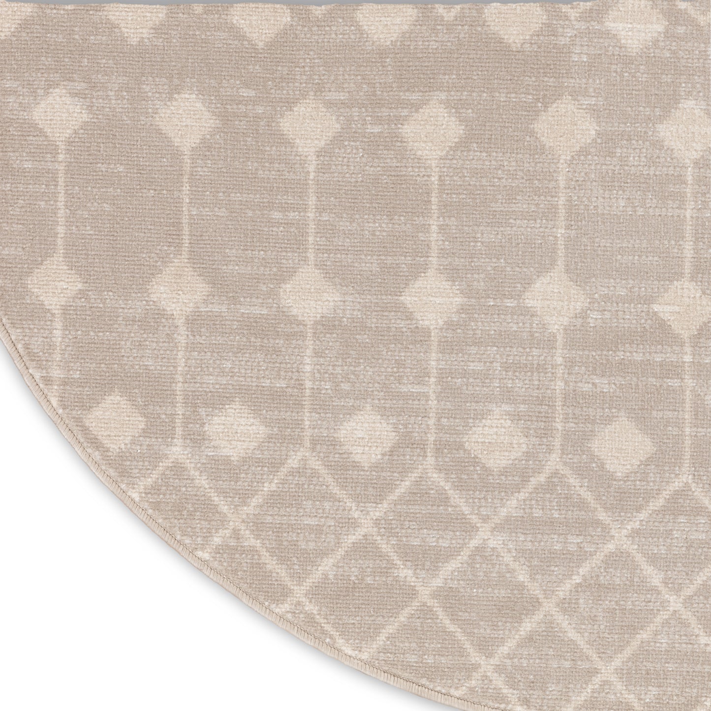 Beige round area rug with cream geometric lattice of diamonds; woven texture for modern neutral decor.