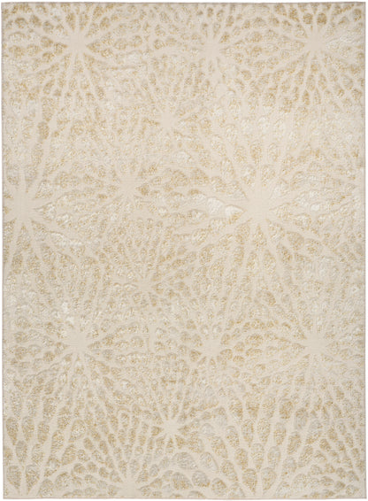 Beige area rug with cream starburst pattern, plush textured surface, neutral decor for living room.