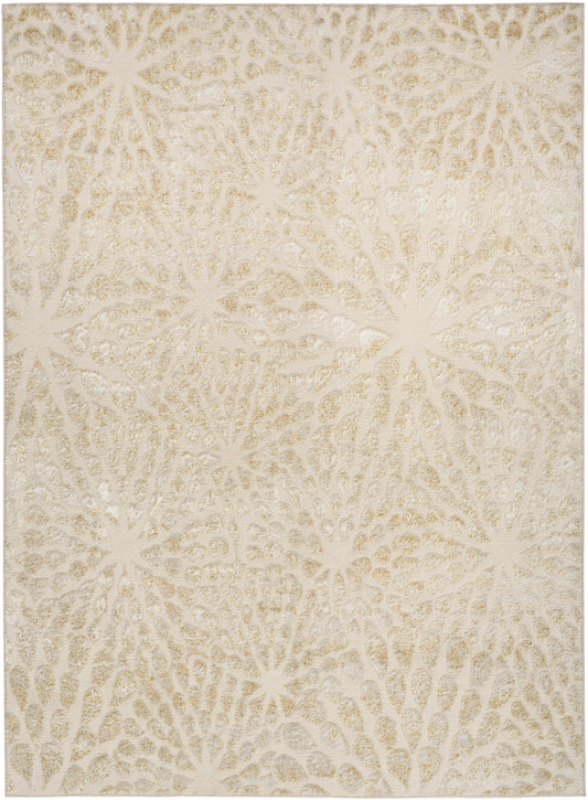Beige area rug with cream starburst pattern, plush textured surface, neutral decor for living room.