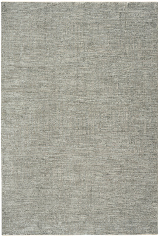 Rectangular gray-beige area rug with subtle tonal patches and soft textured finish; modern neutral for living room.