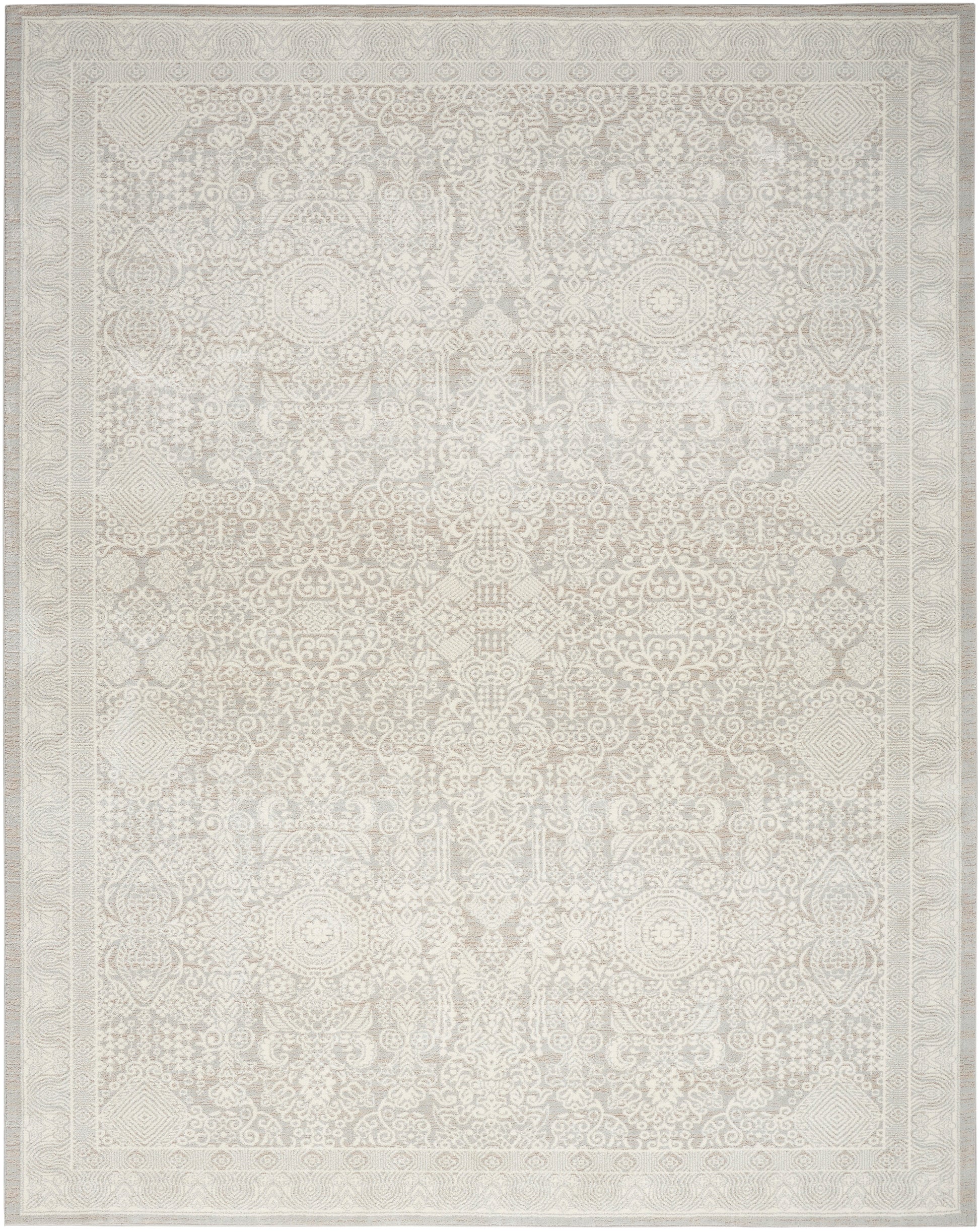 Cream ivory area rug with a muted beige Persian-style floral medallion pattern and ornate border, woven texture.