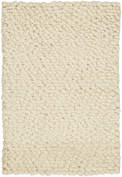 Cream textured rug with pebble-bubble pattern; rectangular shag rug for living room.