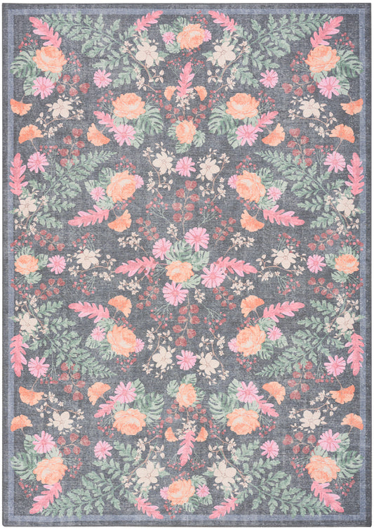 Rectangular floral area rug with peach, pink and white blossoms on a dark navy background, green leaves, and a bordered edge.