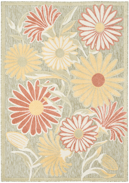 Floral outdoor rug with large pink, peach, and yellow daisies on a textured beige-gray background.