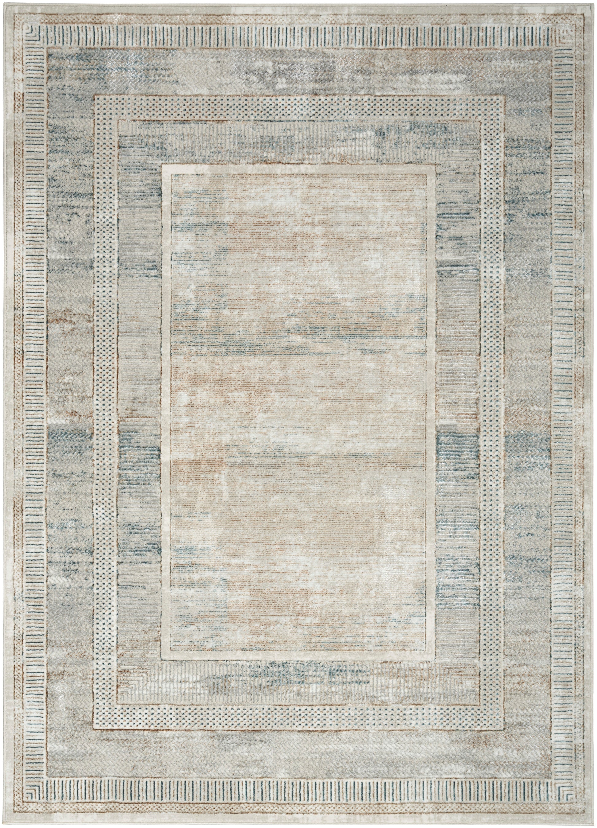 Soft blue-gray area rug with a beige center and cream geometric borders in a distressed vintage style.