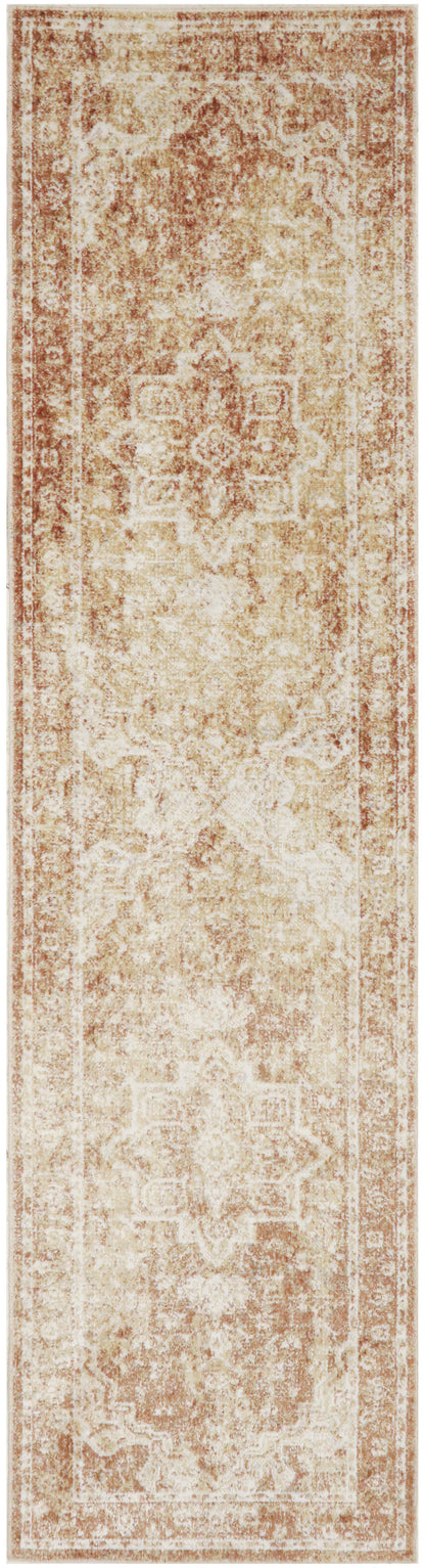 Distressed vintage oriental runner rug in beige and rust tones with a faded medallion border.