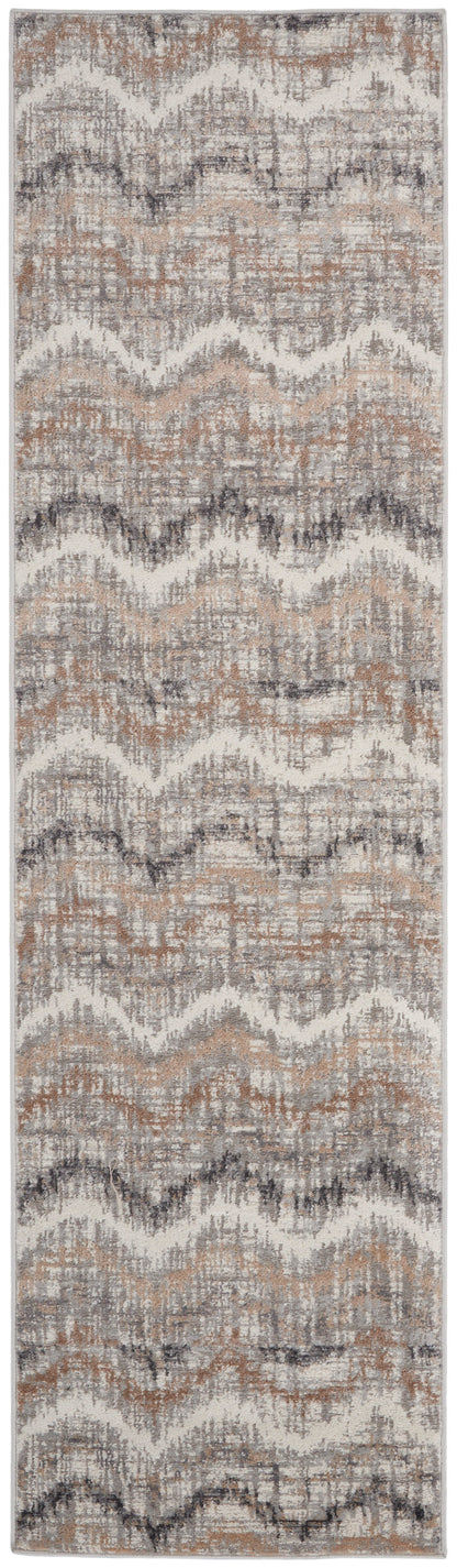 Rectangular runner rug with neutral wavy chevron pattern in beige, taupe, gray and ivory; woven texture.