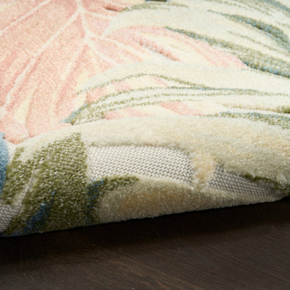 Pastel shag rug with pink, cream, green and blue tones; fluffy texture, abstract pattern, soft living-room flooring.