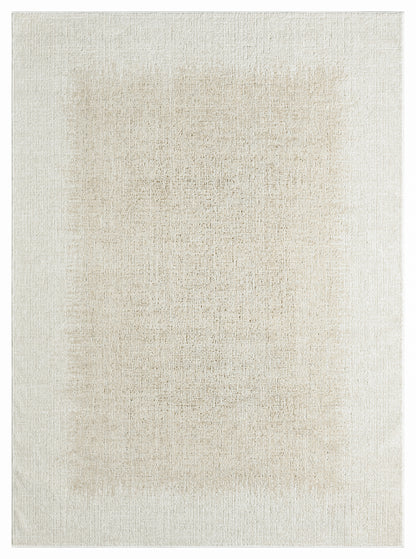 Rectangular beige area rug with a soft, distressed texture and cream-tan tones.