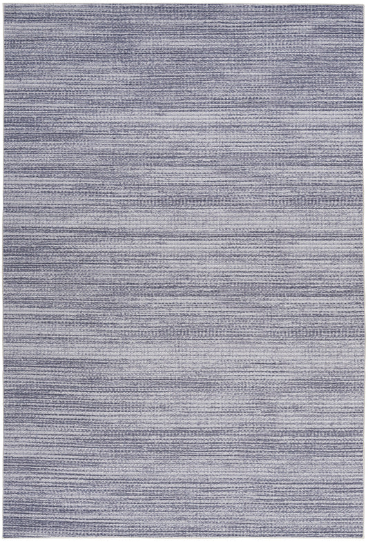 Blue-gray woven area rug with muted horizontal stripes and soft, distressed texture.