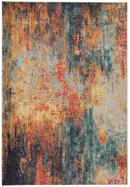Abstract colorful rectangular area rug with warm yellows, oranges and reds, plus teals and blues in a plush textured pile.