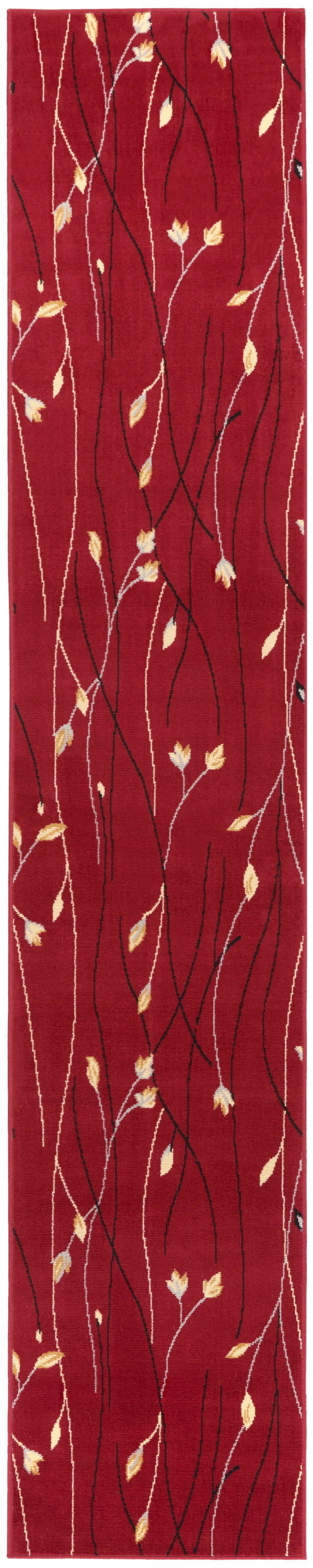 Red narrow runner rug with white and black branchlike vines and small yellow leaves.