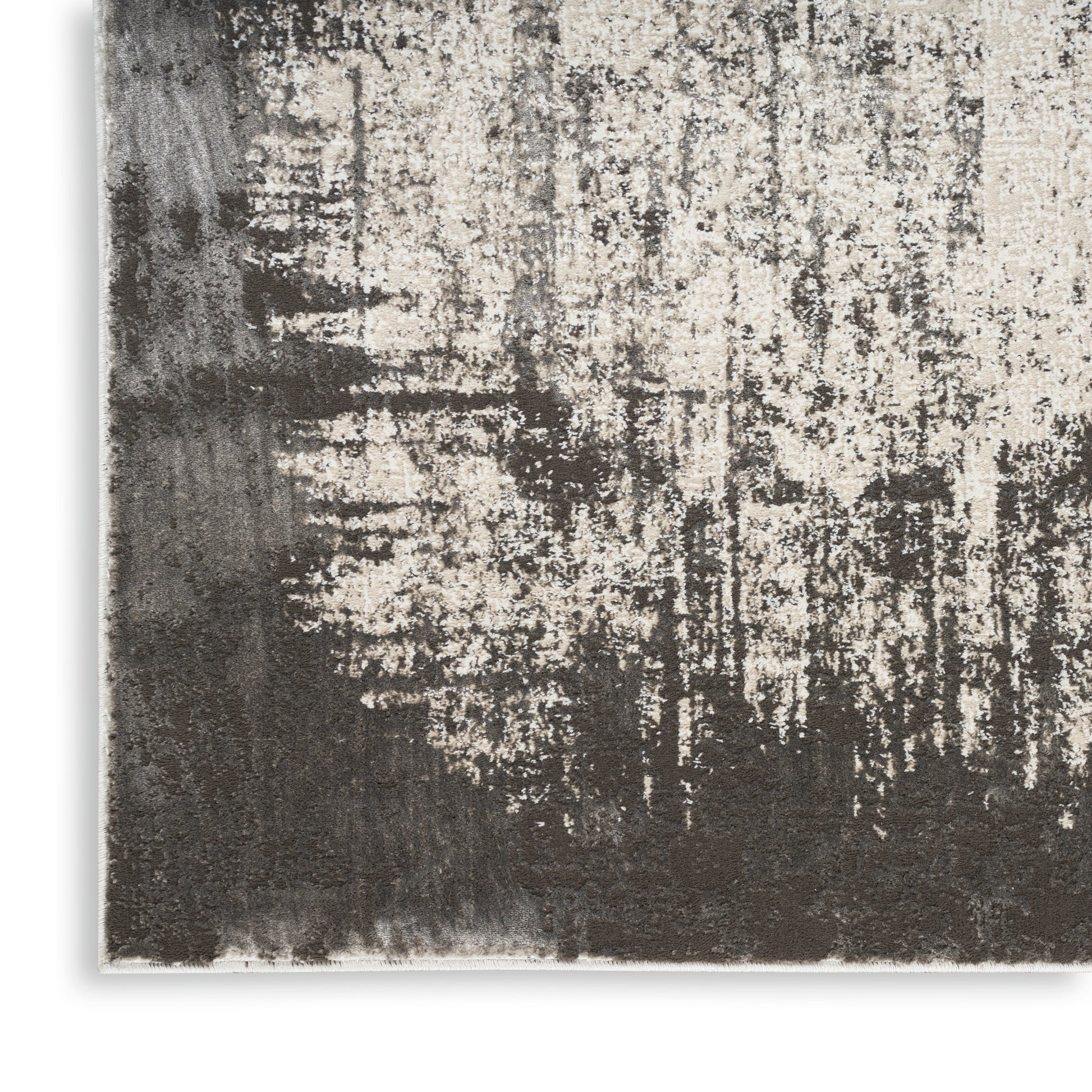 Rectangular abstract distressed area rug in dark brown, beige and ivory tones; textured, painterly pattern.