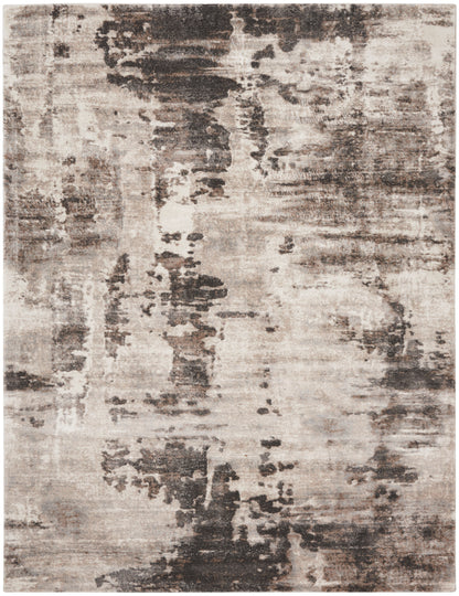 Abstract distressed area rug in beige, taupe & charcoal with soft pile; versatile rectangular decor rug.