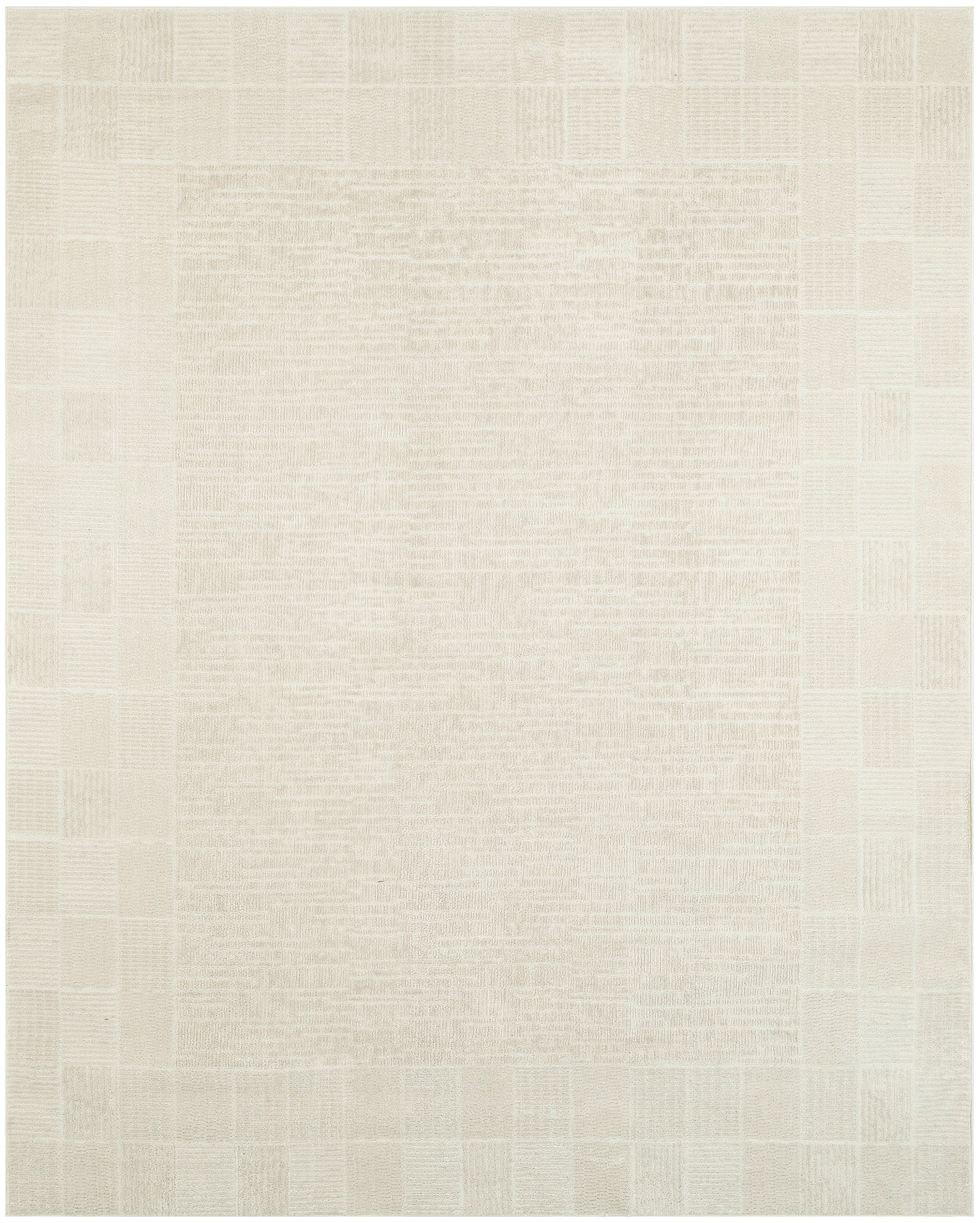 Cream patchwork rug with beige square blocks and woven texture; neutral, rectangular area rug.