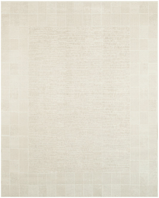 Cream patchwork rug with beige square blocks and woven texture; neutral, rectangular area rug.