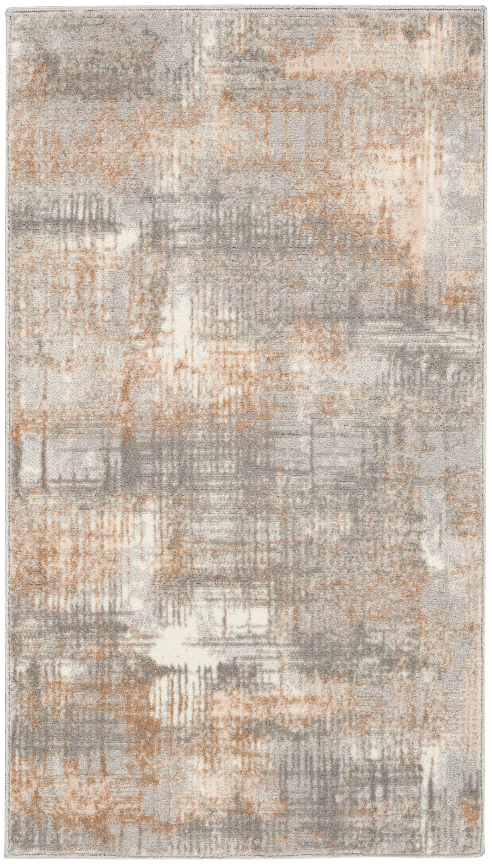 Abstract area rug with gray, taupe and peach tones in a distressed geometric pattern; soft plush pile.