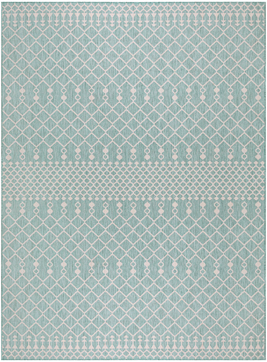 Teal area rug with white lattice diamond pattern and subtle dotted border