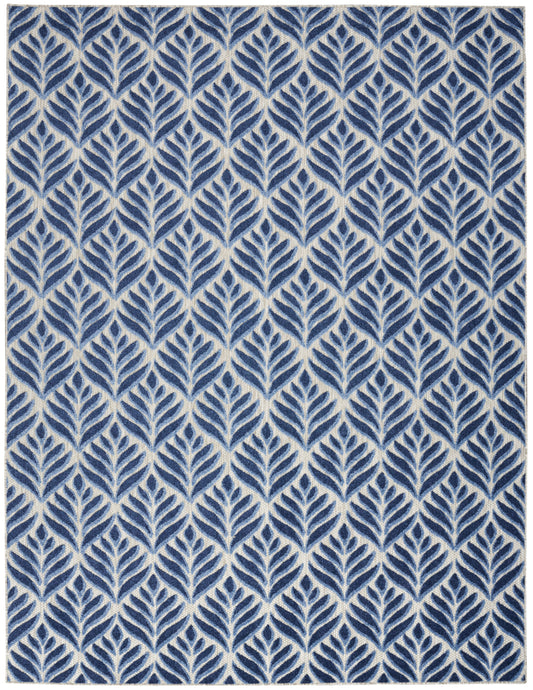 Rectangular rug with a repeating navy leaf pattern on ivory background; woven textile for living spaces.