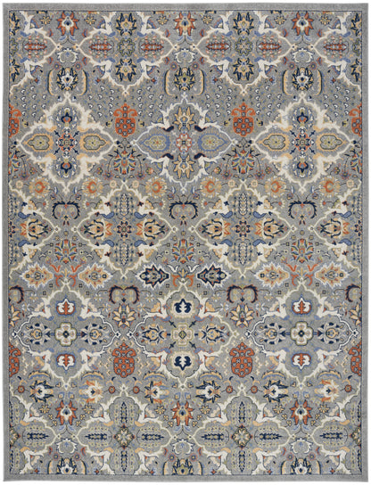 Rectangular Bohemian-style rug with blue-gray field and multicolor floral medallions; wool weave for living room decor.