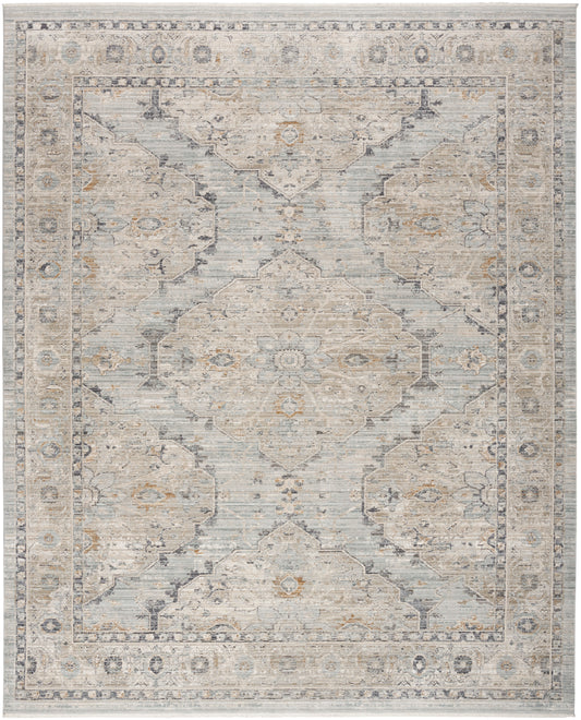 Rectangular area rug in blue-gray and ivory with a distressed oriental medallion design and floral border.