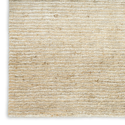 Beige textured loop-pile rug close-up; natural fibers with horizontal ridges.