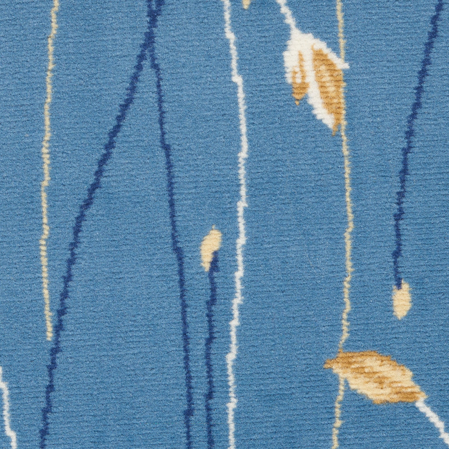 Blue woven rug with cream and navy vertical lines and beige leaf motifs.