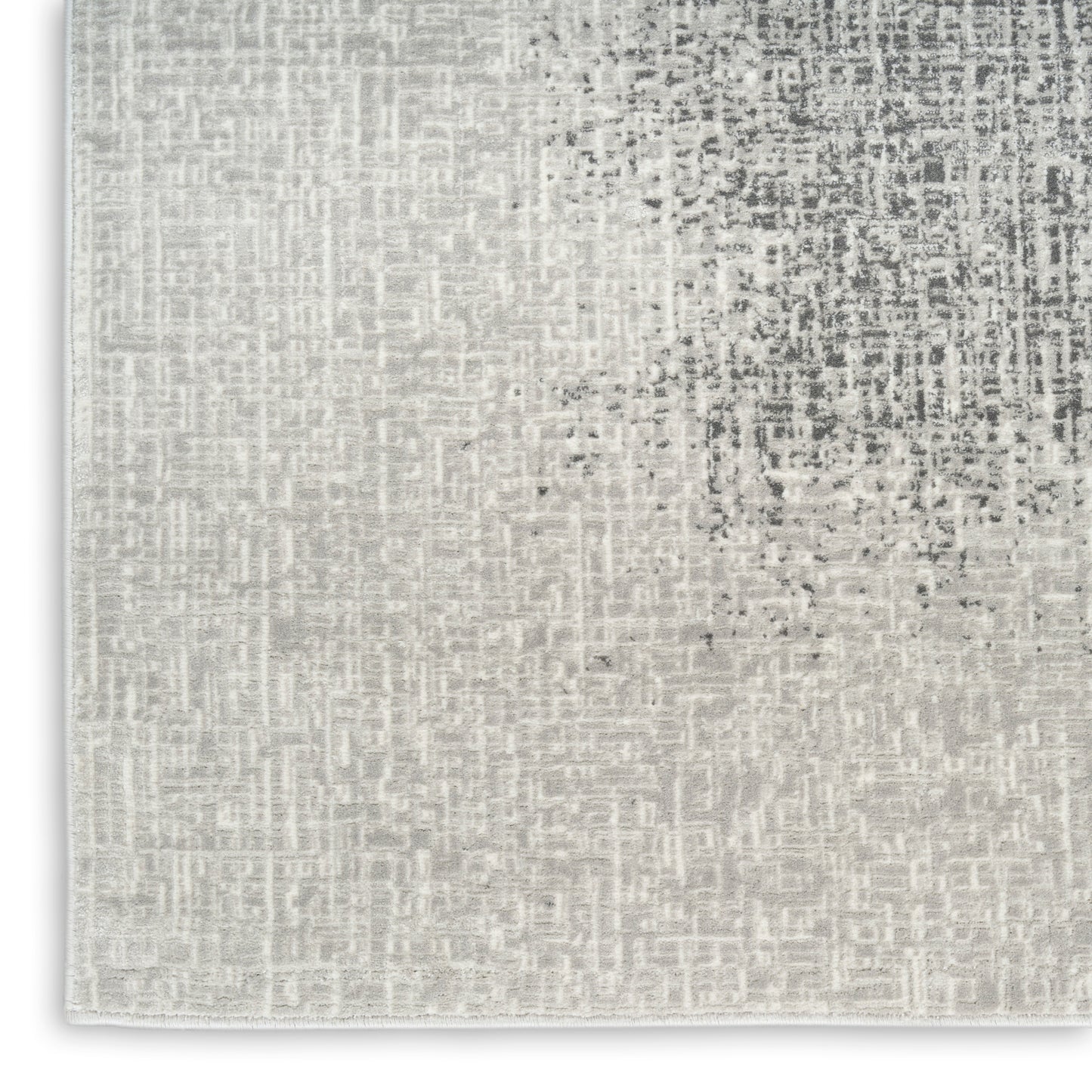 Beige woven rug with subtle gray speckled pattern, flat-weave texture, square shape for modern living spaces.