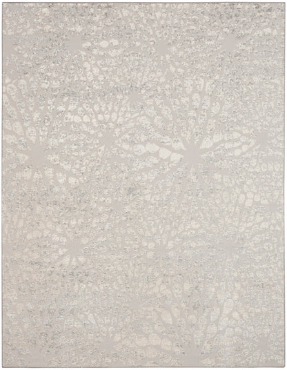 Cream & taupe circular rosette pattern rug with soft textured surface.