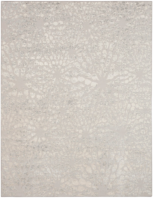 Cream & taupe circular rosette pattern rug with soft textured surface.