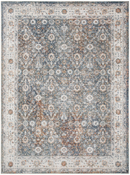 Distressed blue Persian-style area rug with ivory border and intricate floral medallion motifs.