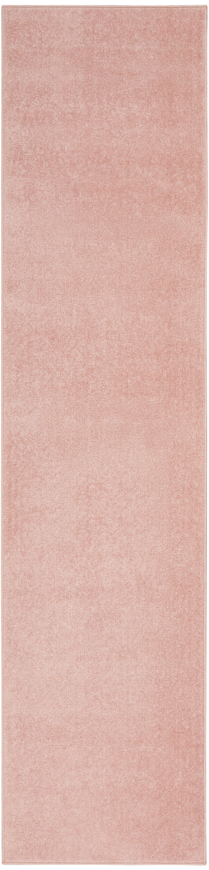 Blush pink outdoor runner rug with clean edges.