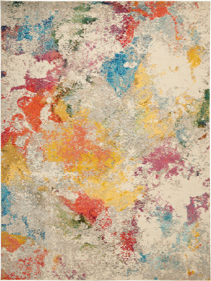 Textured abstract area rug with beige base & vibrant splashes of red, orange, yellow, blue, green & pink.