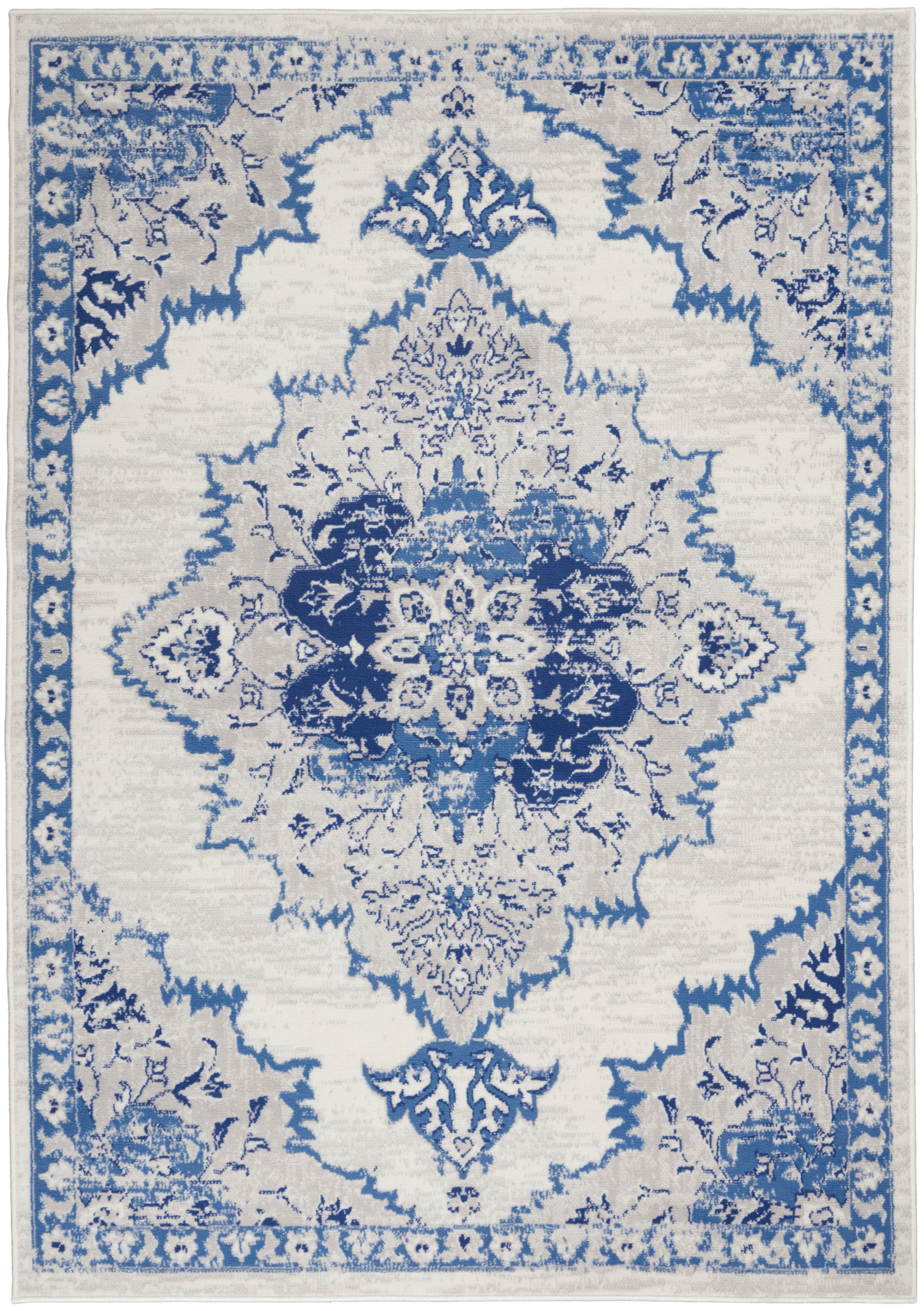 Blue and cream oriental rug with a large central floral medallion and ornate border.