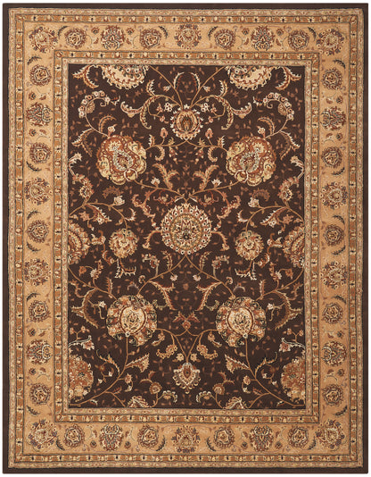 Rectangular Persian-style area rug with dark brown field, beige-gold floral medallions and layered tan borders.