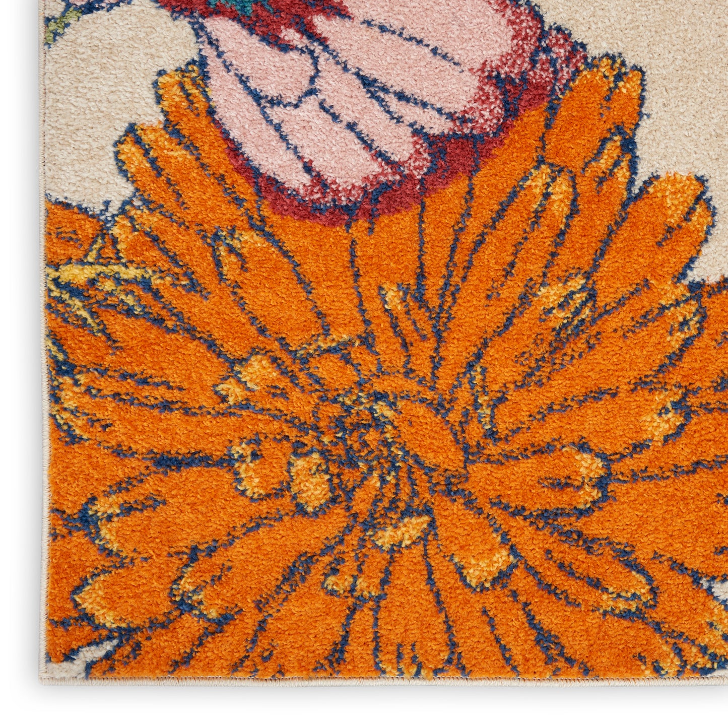 Floral tufted rug with bright orange petals & blue outlines on a cream background; shaggy texture.