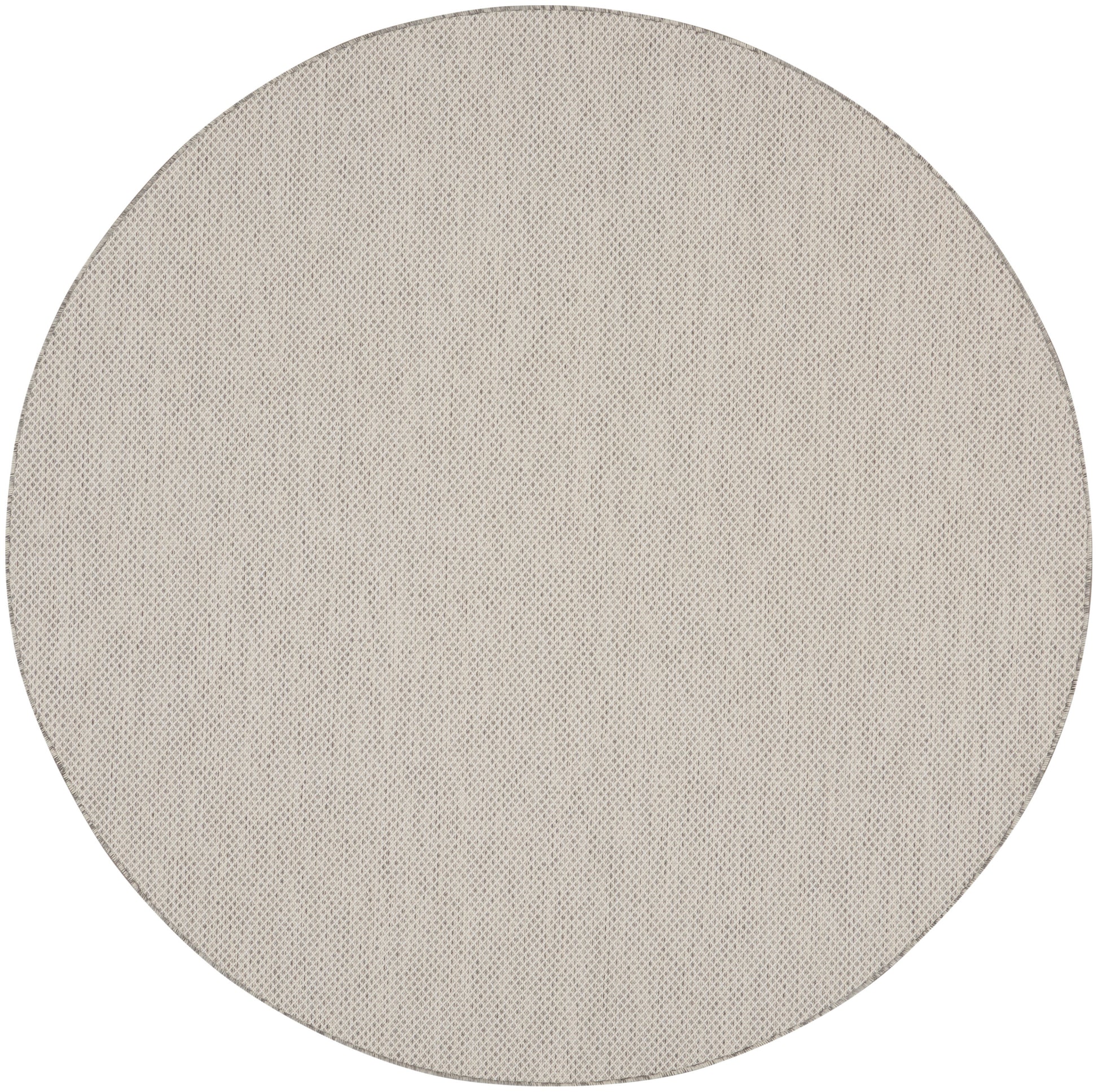 Beige round fabric disc with dotted mesh texture; minimalist round décor accessory.