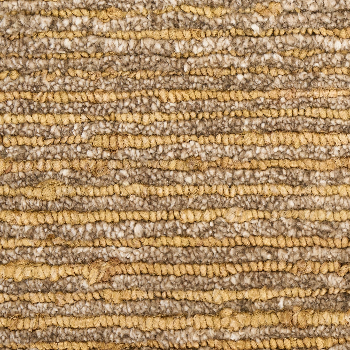 Close-up of a striped beige-tan woven rug with chunky boucle texture in natural fibers.
